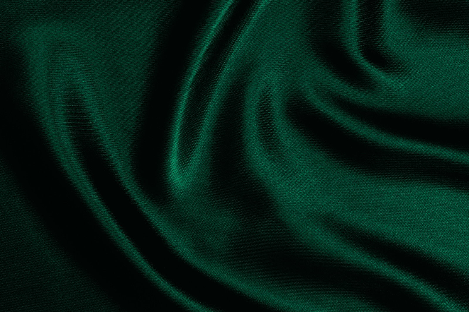 Emerald green satin background